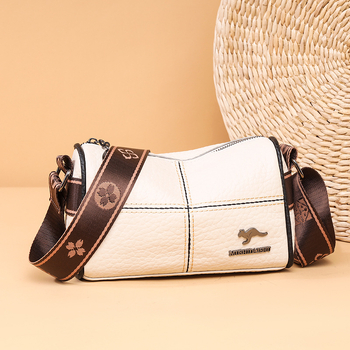 Torba preko ramena od prave kože, prvoklasna teleća koža, vodoravni kvadratni oblik, zatvaranje zipom, podstava od poliestera.