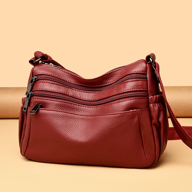 Cross-body torba od prave kože (koža prvog sloja, zatvaranje na zip, horizontalni kvadratni oblik, unutarnji pretinci: džep s zipom, džep za telefon i ID)