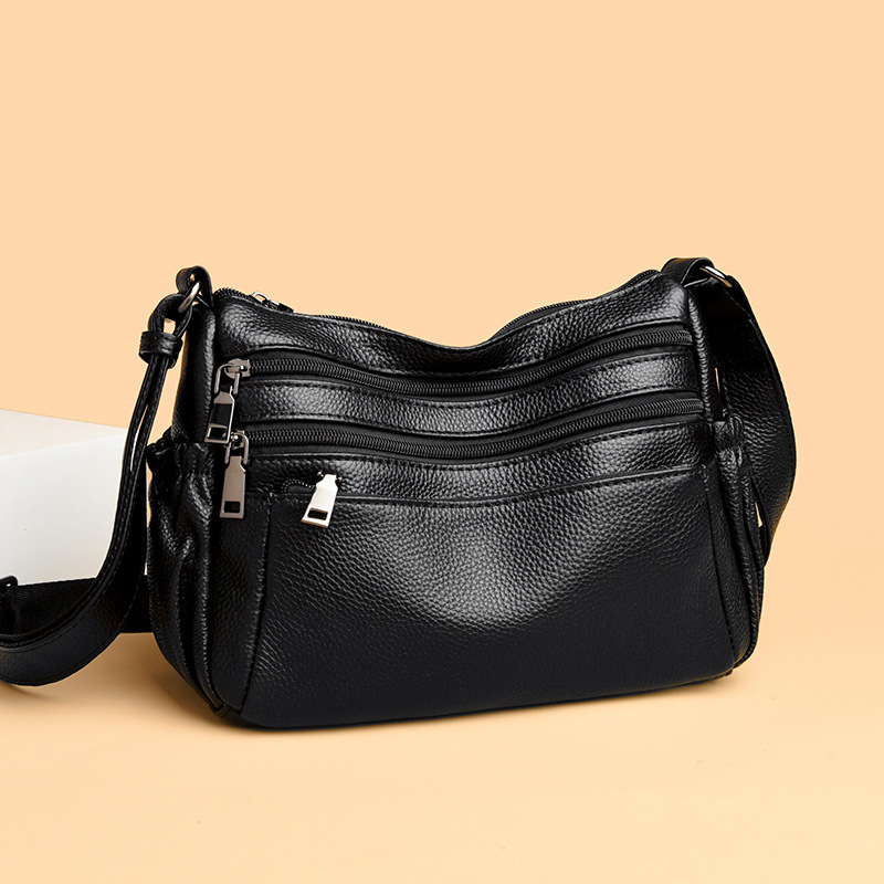 Cross-body torba od prave kože (koža prvog sloja, zatvaranje na zip, horizontalni kvadratni oblik, unutarnji pretinci: džep s zipom, džep za telefon i ID)