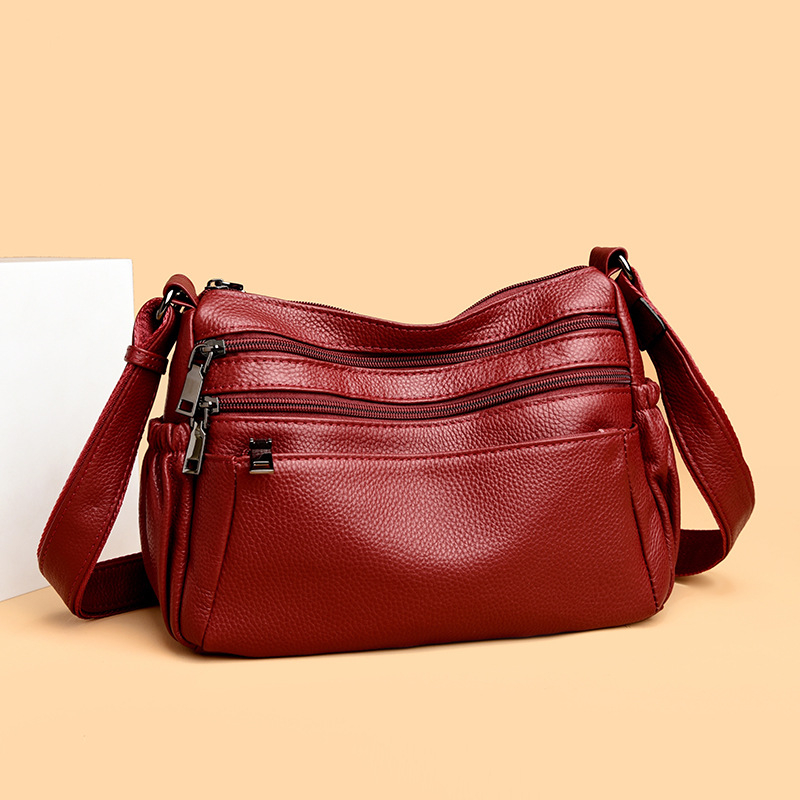 Cross-body torba od prave kože (koža prvog sloja, zatvaranje na zip, horizontalni kvadratni oblik, unutarnji pretinci: džep s zipom, džep za telefon i ID)