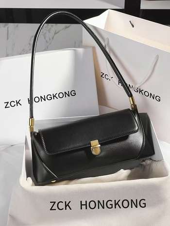 Kožna torbica ispod pazuha, gradski minimalistički stil, horizontalni kvadratni oblik, zatvaranje bravom, unutarnja džep sa zipom, poliester podstava, proljetno izdanje 2025