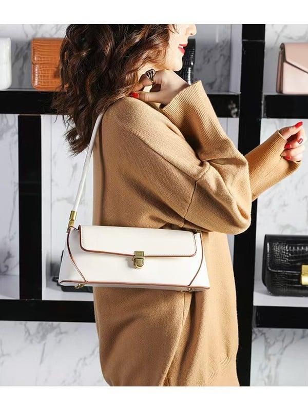 Kožna torbica ispod pazuha, gradski minimalistički stil, horizontalni kvadratni oblik, zatvaranje bravom, unutarnja džep sa zipom, poliester podstava, proljetno izdanje 2025