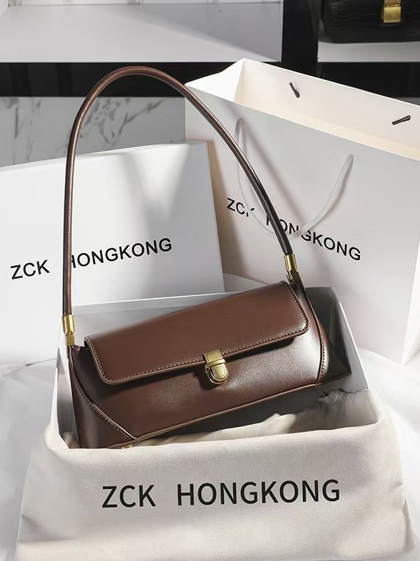 Kožna torbica ispod pazuha, gradski minimalistički stil, horizontalni kvadratni oblik, zatvaranje bravom, unutarnja džep sa zipom, poliester podstava, proljetno izdanje 2025