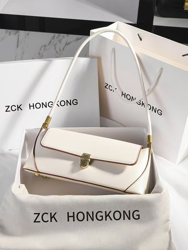 Kožna torbica ispod pazuha, gradski minimalistički stil, horizontalni kvadratni oblik, zatvaranje bravom, unutarnja džep sa zipom, poliester podstava, proljetno izdanje 2025