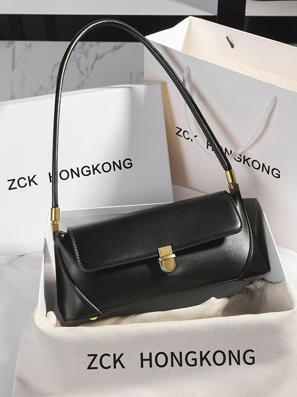 Kožna torbica ispod pazuha, gradski minimalistički stil, horizontalni kvadratni oblik, zatvaranje bravom, unutarnja džep sa zipom, poliester podstava, proljetno izdanje 2025