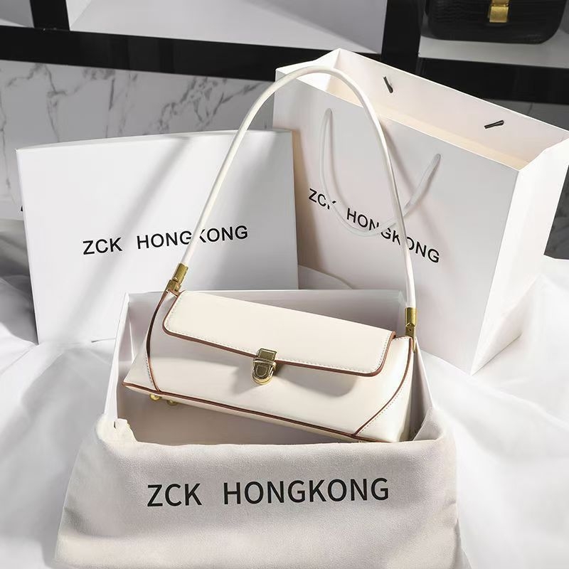 Kožna torbica ispod pazuha, gradski minimalistički stil, horizontalni kvadratni oblik, zatvaranje bravom, unutarnja džep sa zipom, poliester podstava, proljetno izdanje 2025