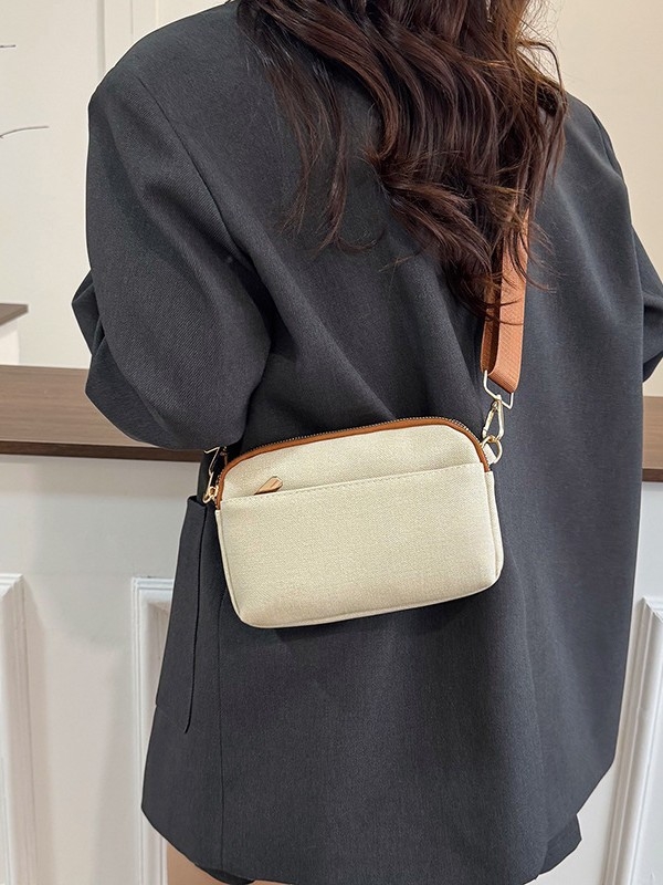 PU crossbody torba – kvadratnog oblika, zatvarač, unutarnji džepovi za telefon i dokumente, jedan remen, svakodnevna upotreba