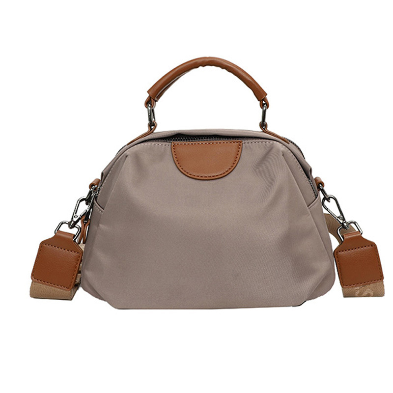 Ženska crossbody torba od Oxford platna, lagana s velikim kapacitetom, višeslojna unutarnja organizacija, zatvara se zipom, unutarnji džepovi za telefon, ID i džep na zip, jedna naramenica