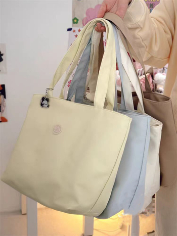 Oxford szövetből készült tote táska városi egyszerű stílusban, cipzáras nyitás, poliészter bélés, belső telefonzseb