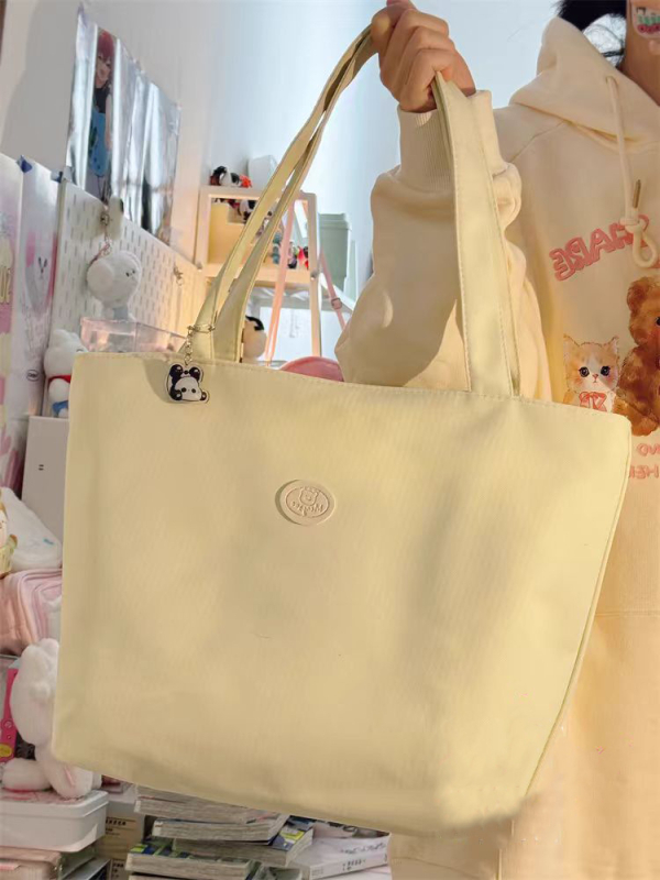 Oxford szövetből készült tote táska városi egyszerű stílusban, cipzáras nyitás, poliészter bélés, belső telefonzseb