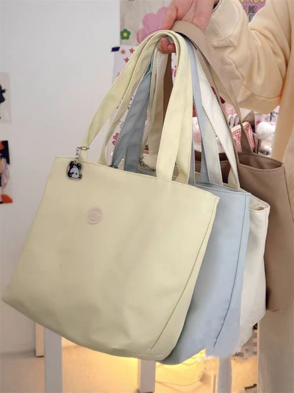 Oxford szövetből készült tote táska városi egyszerű stílusban, cipzáras nyitás, poliészter bélés, belső telefonzseb