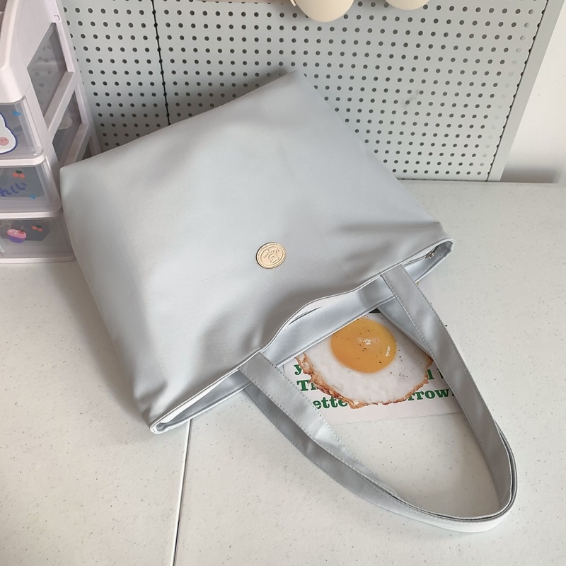 Oxford szövetből készült tote táska városi egyszerű stílusban, cipzáras nyitás, poliészter bélés, belső telefonzseb