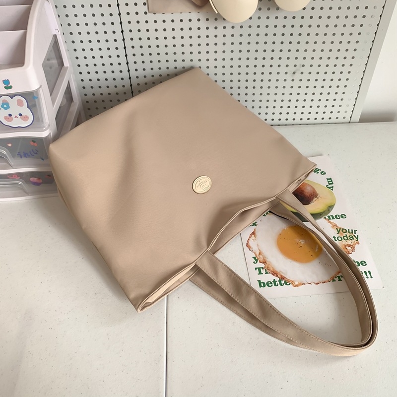 Oxford szövetből készült tote táska városi egyszerű stílusban, cipzáras nyitás, poliészter bélés, belső telefonzseb