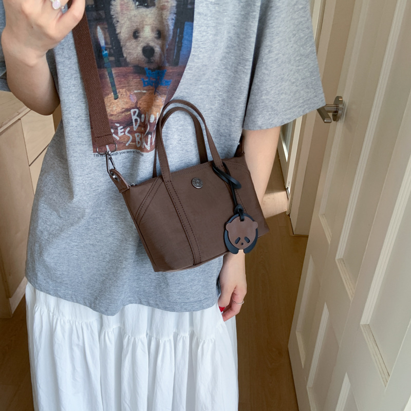 2025 nova ženska dumpling torba s privjeskom, džepom za telefon, mala crossbody/ramena torba