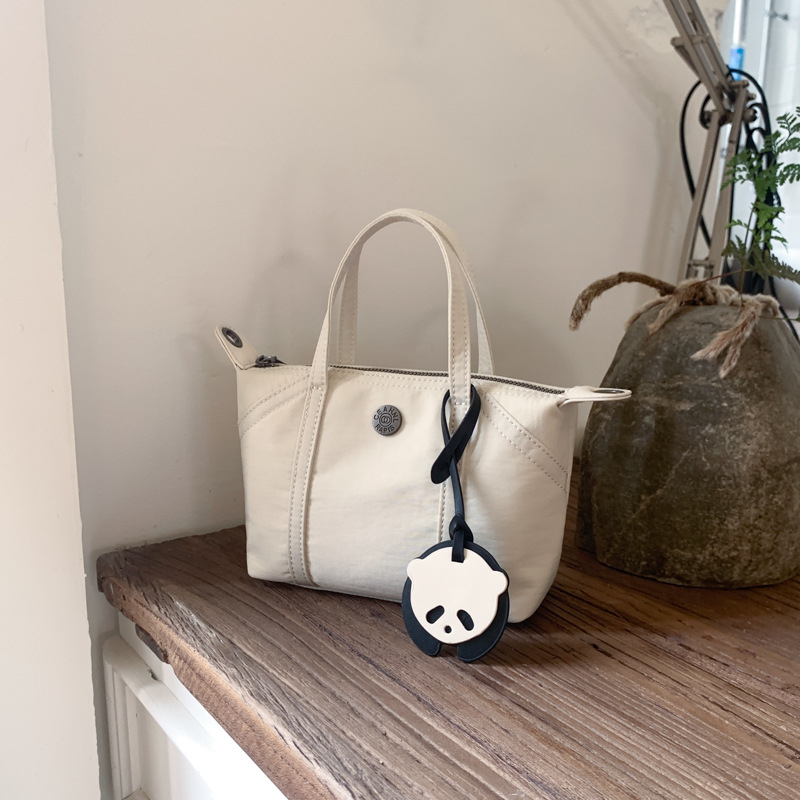 2025 nova ženska dumpling torba s privjeskom, džepom za telefon, mala crossbody/ramena torba