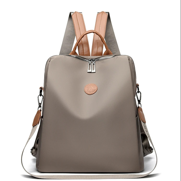 Ruksak od Oxford tkanine, višefunkcionalan za svakodnevnu upotrebu i putovanja, velik kapacitet; unutarnja pregrada sa zipom i džep za mobitel; vodootporan i otporan na habanje.