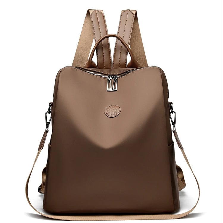 Ruksak od Oxford tkanine, višefunkcionalan za svakodnevnu upotrebu i putovanja, velik kapacitet; unutarnja pregrada sa zipom i džep za mobitel; vodootporan i otporan na habanje.