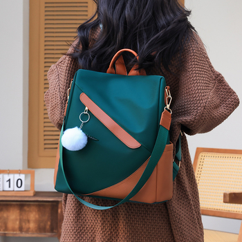 Ženski ruksak od Oxford platna s zaštitom od krađe, velik kapacitet; zatvaranje na zip; unutarnji džepovi za prijenosno računalo i kameru; unutarnji podijeljeni pretinac; trodimenzionalni dizajn.