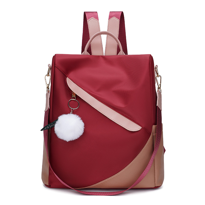 Ženski ruksak od Oxford platna s zaštitom od krađe, velik kapacitet; zatvaranje na zip; unutarnji džepovi za prijenosno računalo i kameru; unutarnji podijeljeni pretinac; trodimenzionalni dizajn.