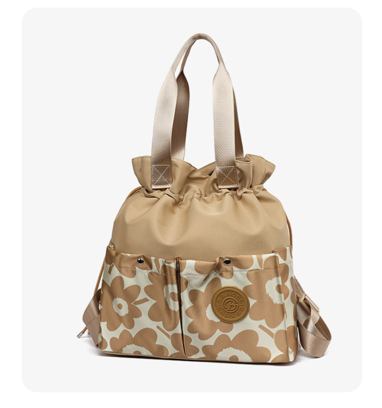 Ženski ruksak s šnornim zatvaračem od Oxford platna; džep za telefon; vanjski otvoreni džep; prozračan