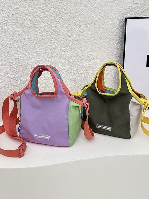 Bucket torba za žene, Oxford tkanina, oblik koša, magnetska kopča, otvoren vanjski džep, jedna naramenica (Materijal: Oxford; Oblik: košara; Zatvaranje: magnetsko; Vanjski džep: otvoren; Remen: jedna)
