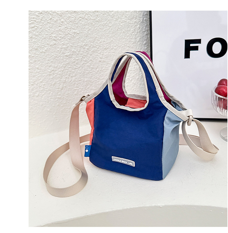 Bucket torba za žene, Oxford tkanina, oblik koša, magnetska kopča, otvoren vanjski džep, jedna naramenica (Materijal: Oxford; Oblik: košara; Zatvaranje: magnetsko; Vanjski džep: otvoren; Remen: jedna)