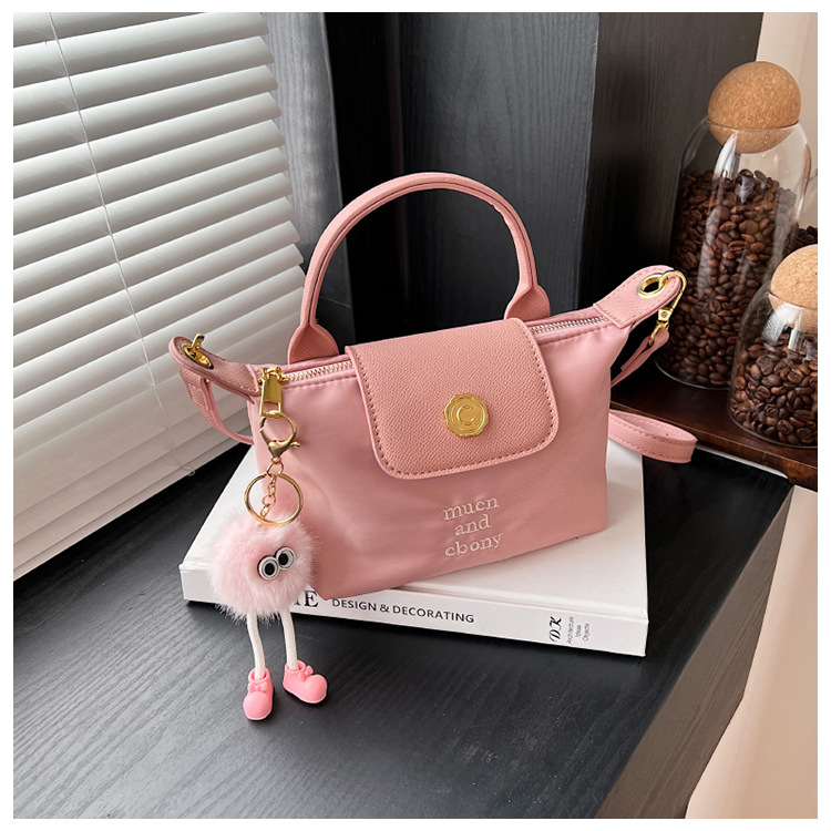 Ženska mini dumpling torbica, crossbody i ručno nošenje, lagana i kompaktna