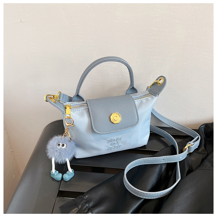 Ženska mini dumpling torbica, crossbody i ručno nošenje, lagana i kompaktna