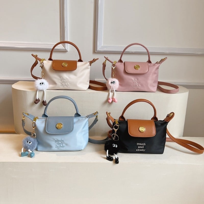 Ženska mini dumpling torbica, crossbody i ručno nošenje, lagana i kompaktna