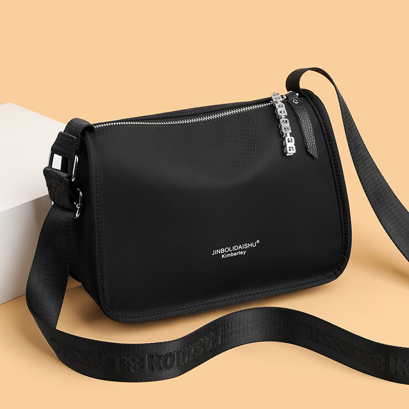 Ženska torba preko ramena od Oxford platna, mali kvadratni gradski stil, zatvarač, unutarnji džepovi za telefon i osobnu iskaznicu