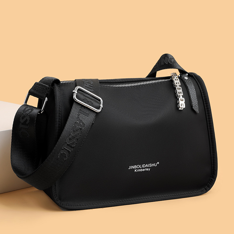 Ženska torba preko ramena od Oxford platna, mali kvadratni gradski stil, zatvarač, unutarnji džepovi za telefon i osobnu iskaznicu