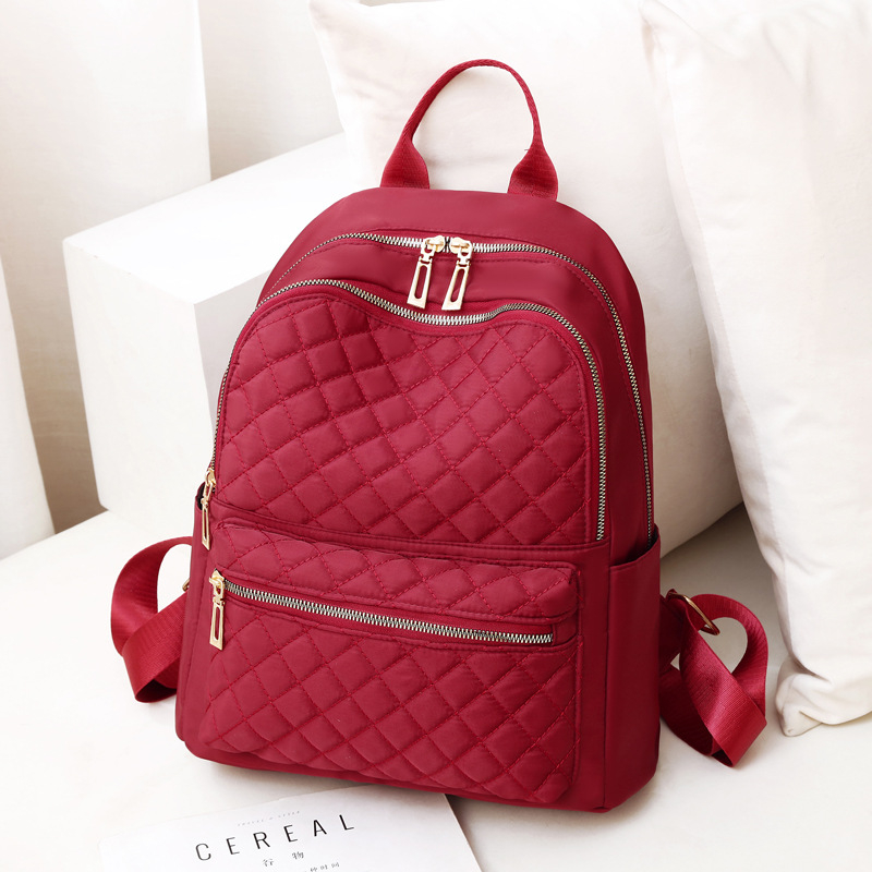 Ruksak od Oxford platna u gradskoj maniri, s više unutarnjih džepova, zatvaračem, vodootporan i protivkrađanski