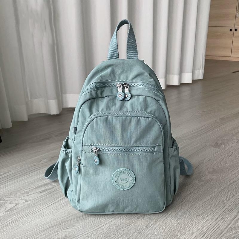 Ženski ruksak od Oxford platna, vodootporan, trodimenzionalni vanjski dizajn, unutarnja laminirana džep s zatvaračem i međuspremnik, zimska 2024 kolekcija