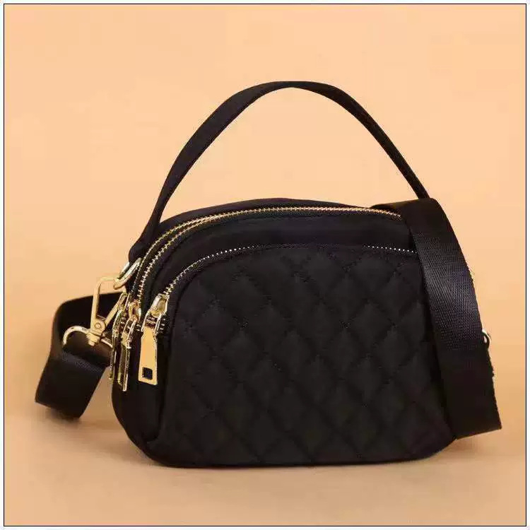 Ženska crossbody torba s prošivenim nitima, gradski minimalistički stil, mala kvadratna torba, Oxford materijal, zatvarač, unutarnji džepovi za telefon i dokumente