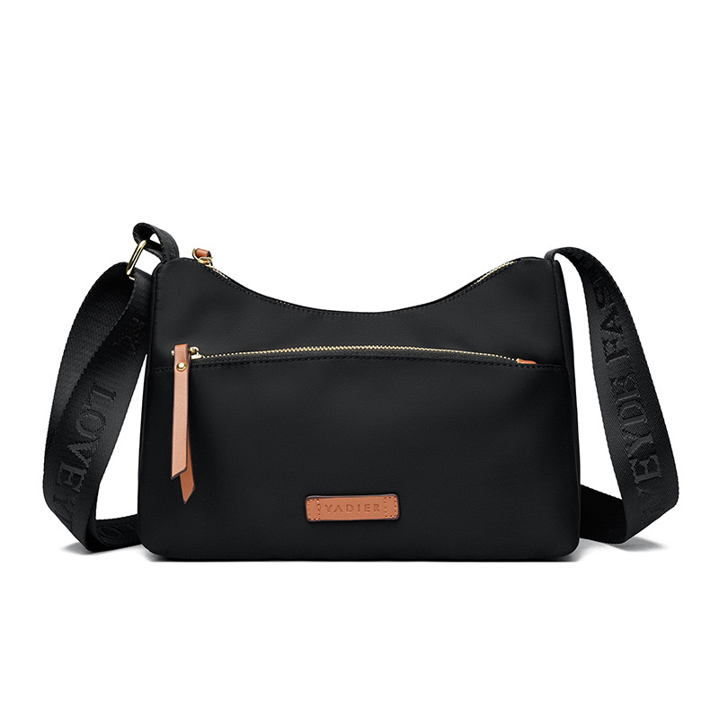 Ženska crossbody torbica u gradskom stilu od Oxford platna, vodoravno kvadratnog oblika, s džepom na zip