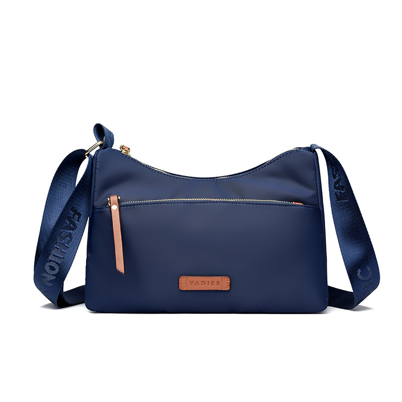 Ženska crossbody torbica u gradskom stilu od Oxford platna, vodoravno kvadratnog oblika, s džepom na zip