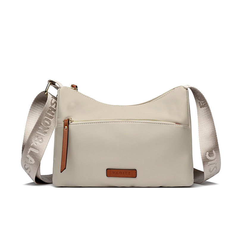 Ženska crossbody torbica u gradskom stilu od Oxford platna, vodoravno kvadratnog oblika, s džepom na zip