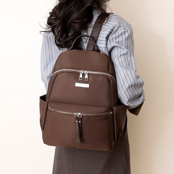Ženski ruksak za gradski stil, Oxford platno, poliester podstava, otvaranje na zip, unutarnja organizacija: tajni džep sa zatvaračem, džep za telefon, džep sa zatvaračem