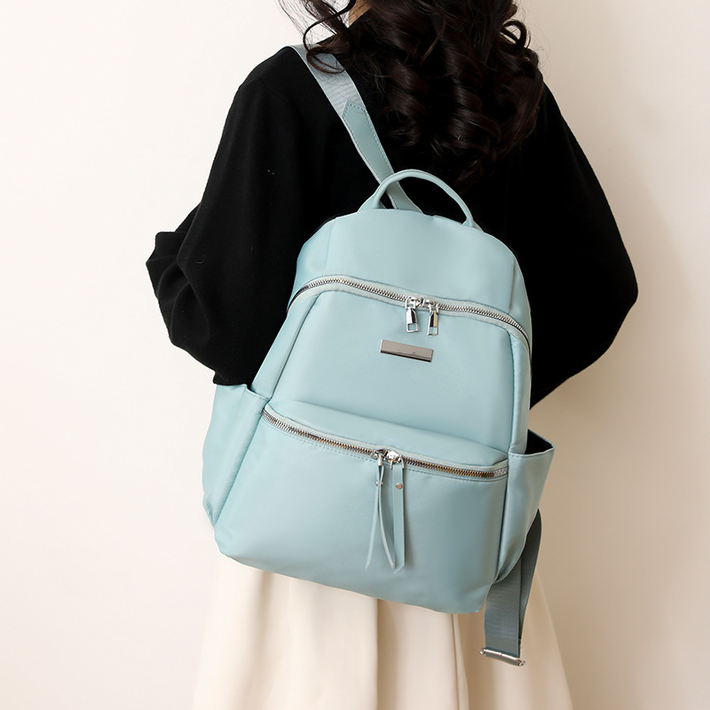 Ženski ruksak za gradski stil, Oxford platno, poliester podstava, otvaranje na zip, unutarnja organizacija: tajni džep sa zatvaračem, džep za telefon, džep sa zatvaračem