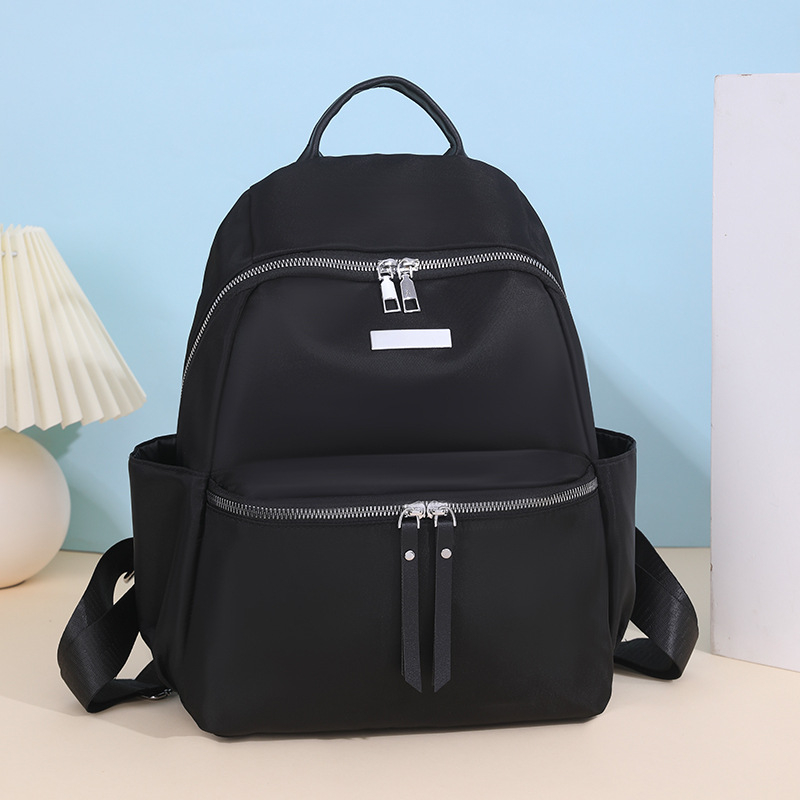 Ženski ruksak za gradski stil, Oxford platno, poliester podstava, otvaranje na zip, unutarnja organizacija: tajni džep sa zatvaračem, džep za telefon, džep sa zatvaračem