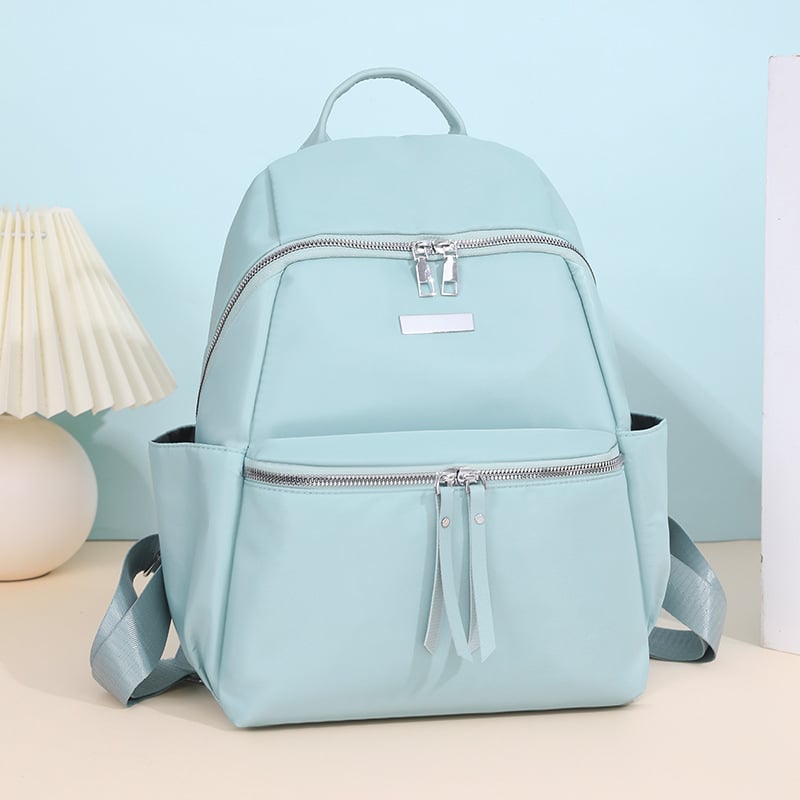 Ženski ruksak za gradski stil, Oxford platno, poliester podstava, otvaranje na zip, unutarnja organizacija: tajni džep sa zatvaračem, džep za telefon, džep sa zatvaračem