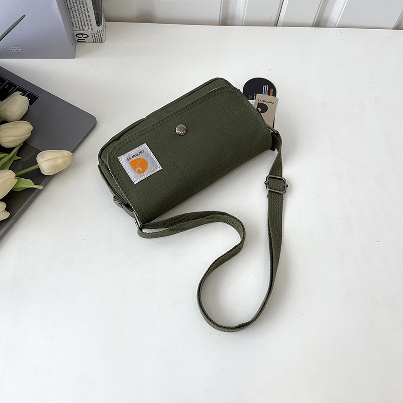 Crossbody torba — Oxford materijal, horizontalni kvadratni dizajn, zatvaranje s poklopcem, unutarnji džepovi za telefon i osobnu iskaznicu