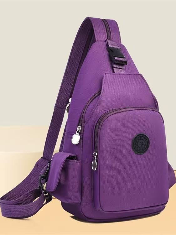 Unisex ruksak za svakodnevnu upotrebu s crossbody remenom, od Oxford platna, zatvarač, unutarnja džepa sa zatvaračem i laminiran džep, prozračan i vodootporan.