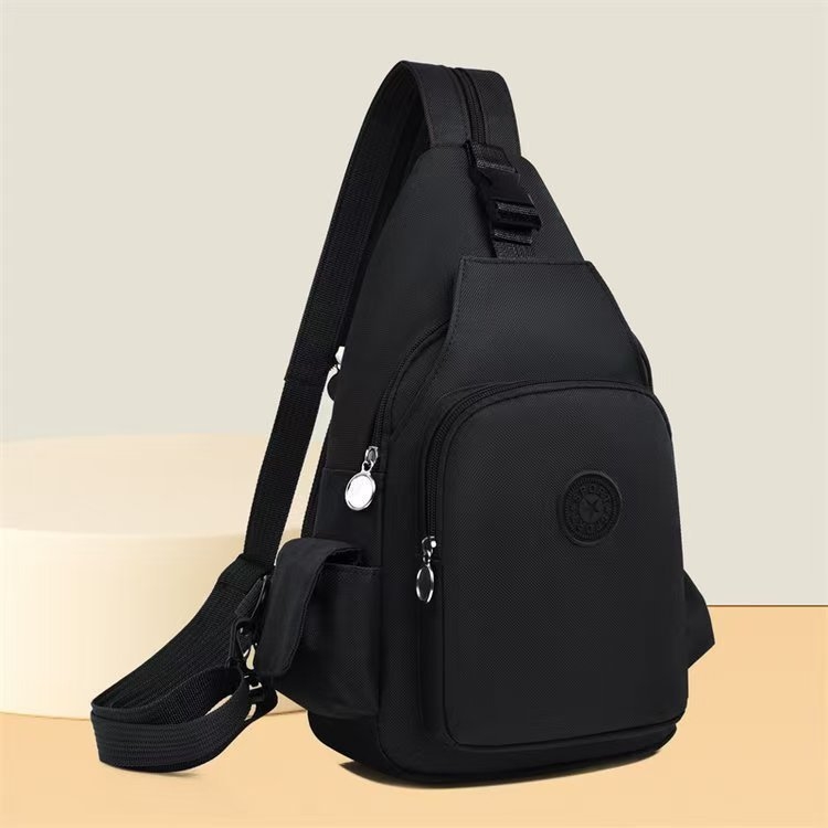 Unisex ruksak za svakodnevnu upotrebu s crossbody remenom, od Oxford platna, zatvarač, unutarnja džepa sa zatvaračem i laminiran džep, prozračan i vodootporan.