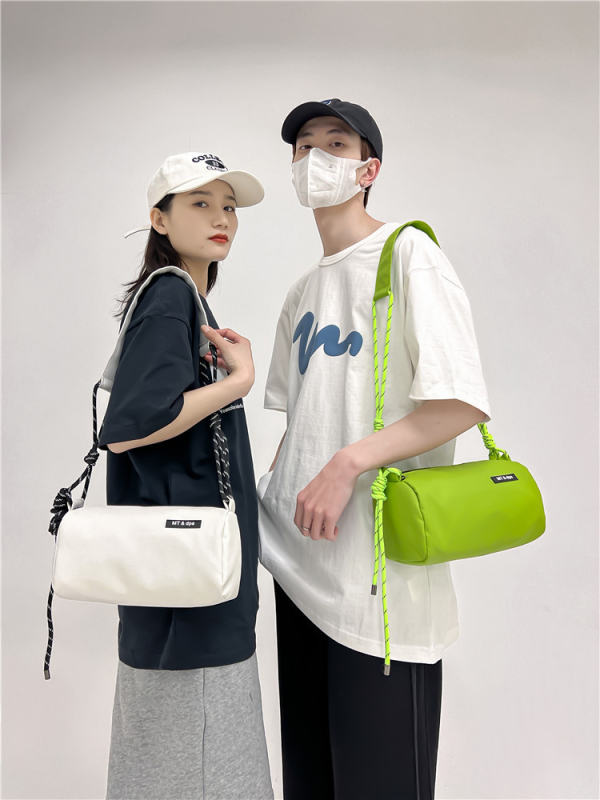 Unisex bucket torba, cilindričnog oblika, od Leather film oxford cloth, podstava od poliestera, zatvarač