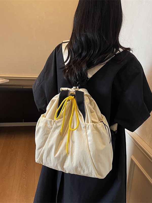 Ženska crossbody bucket torba — uličnog stila, Oxford materijal, otvaranje šnuralom, unutarnji džep na zip i džep za dokumente, dvostruki remeni, pogodna za svakodnevnu upotrebu