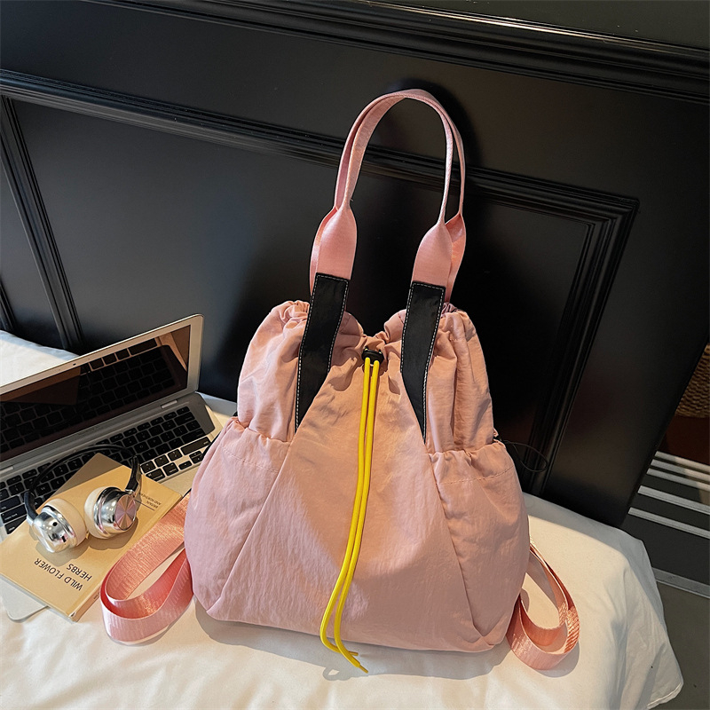 Ženska crossbody bucket torba — uličnog stila, Oxford materijal, otvaranje šnuralom, unutarnji džep na zip i džep za dokumente, dvostruki remeni, pogodna za svakodnevnu upotrebu