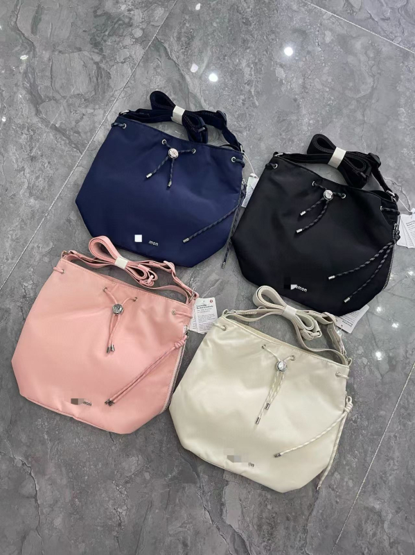 Torba bucket s vezicom – kapaciteta 5L, Oxford platno, gradski stil, džep na zip i džep za telefon