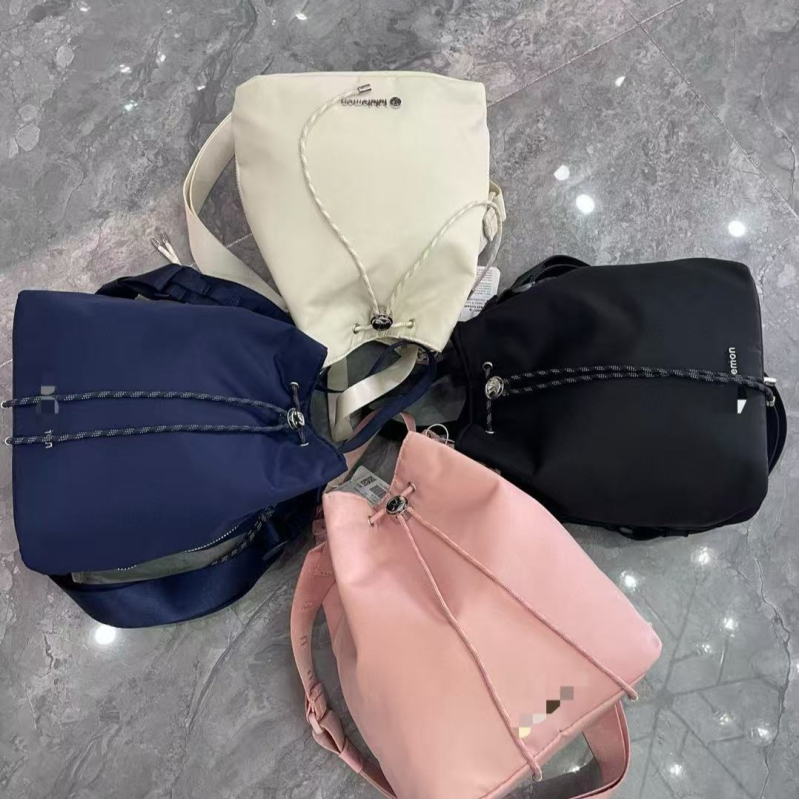 Torba bucket s vezicom – kapaciteta 5L, Oxford platno, gradski stil, džep na zip i džep za telefon