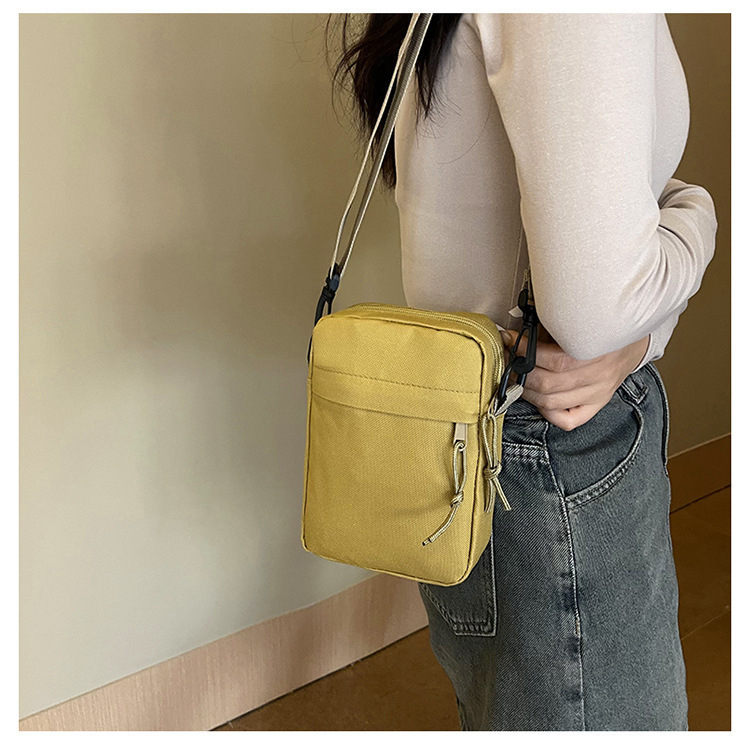 Crossbody torba, ulični stil, Oxford platno, vertikalni kvadratni oblik, zatvaranje zipom, unutarnji džepovi: džep sa zipom, džep za telefon, zip s tipom sendvič